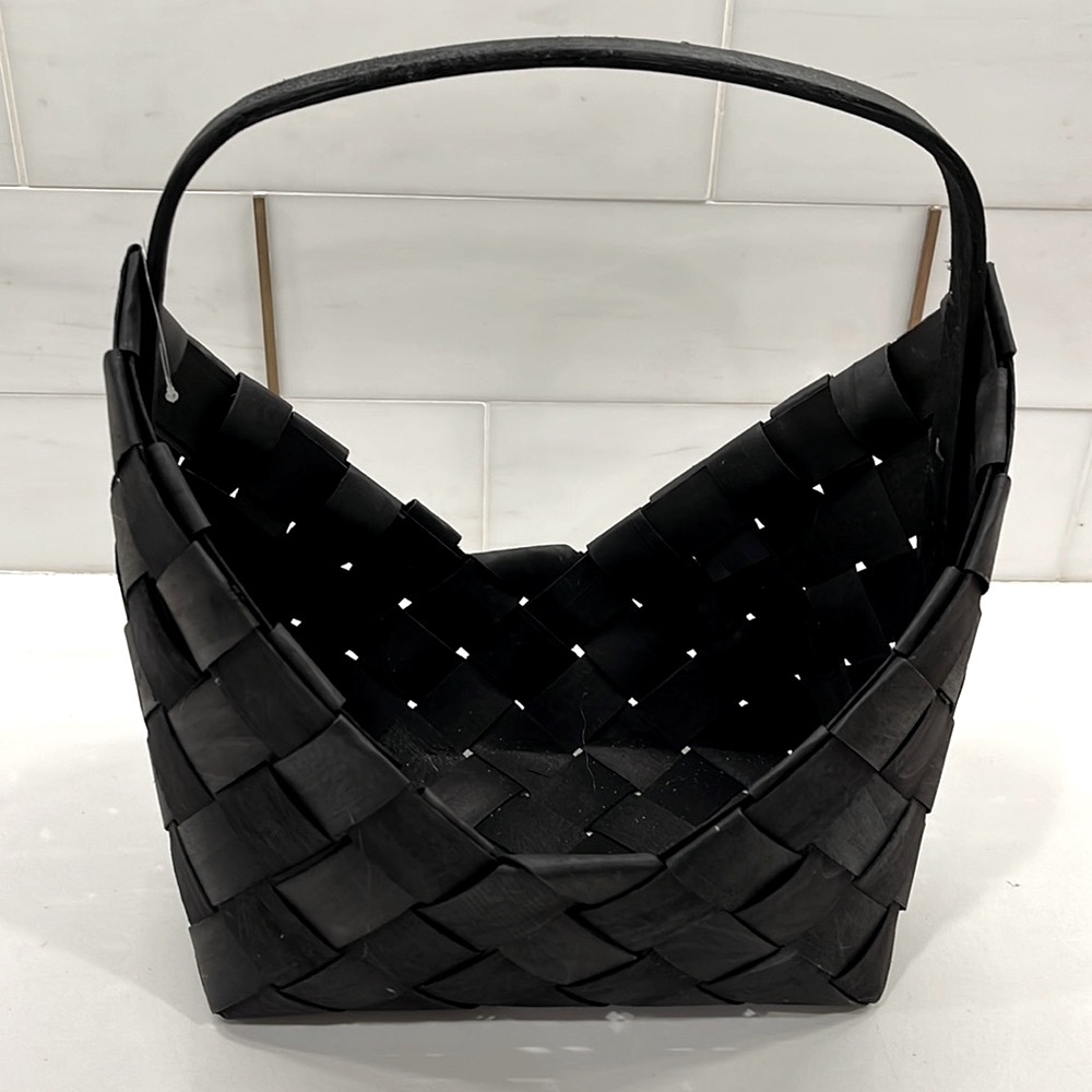 Hobby Lobby Decorative Black asymmetrical opening with wide weaving details.
